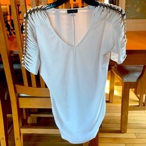 Off-white top with peek-a-boo chain link sleeves